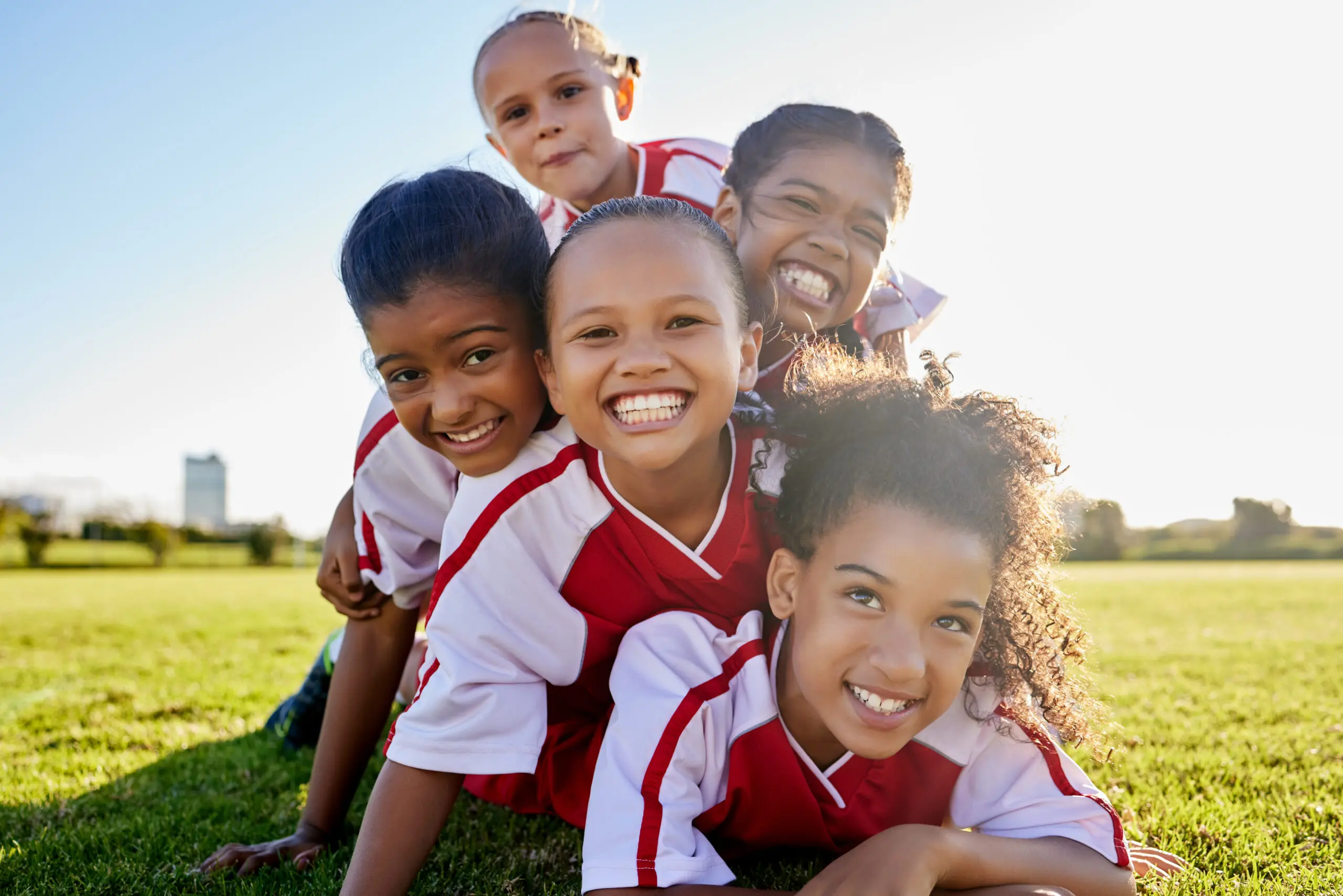 Young kids happy on the soccer pitch