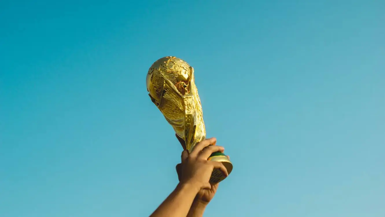 Spain wins, Image of World CUp trophy. SPanish Methodology and MAdrid Euro soccer academy training