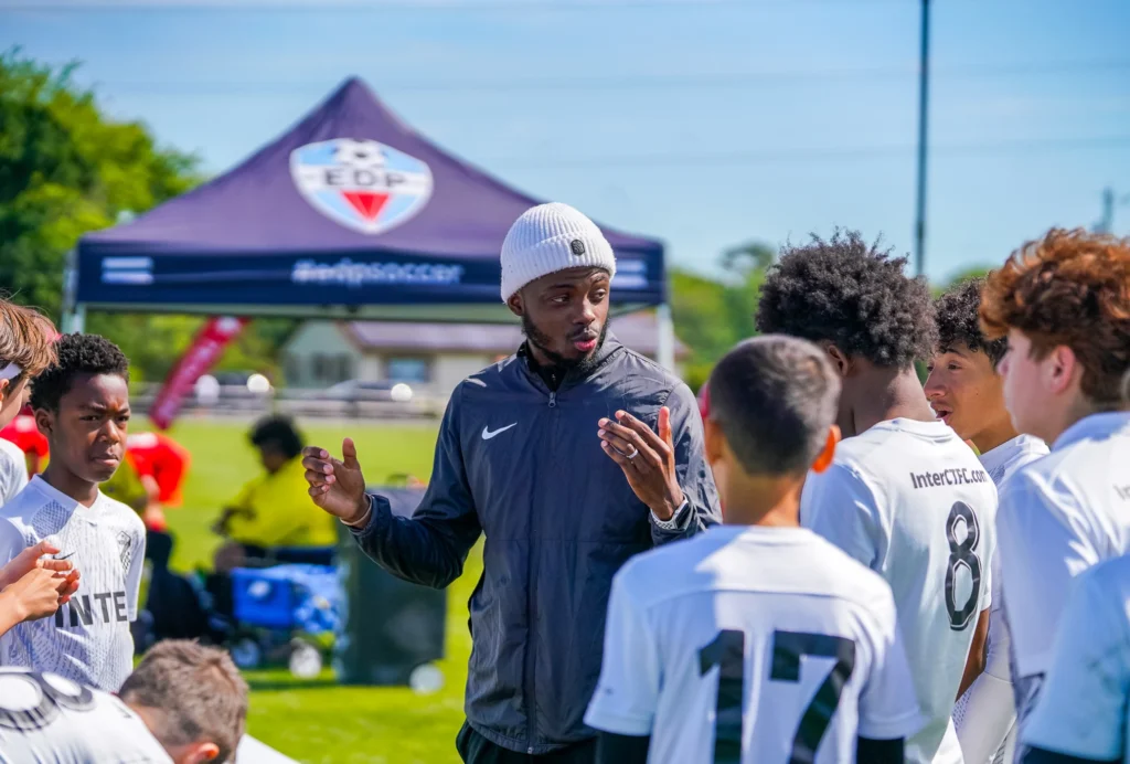 EDP Tournament picture of coach with players