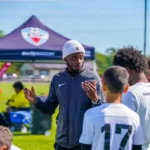 EDP Tournament picture of coach with players