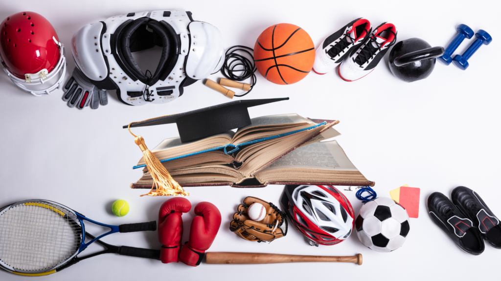 Student sports equipment surrounding open books and graduation cap, symbolizing balance between athletics and academics for well‑rounded youth development