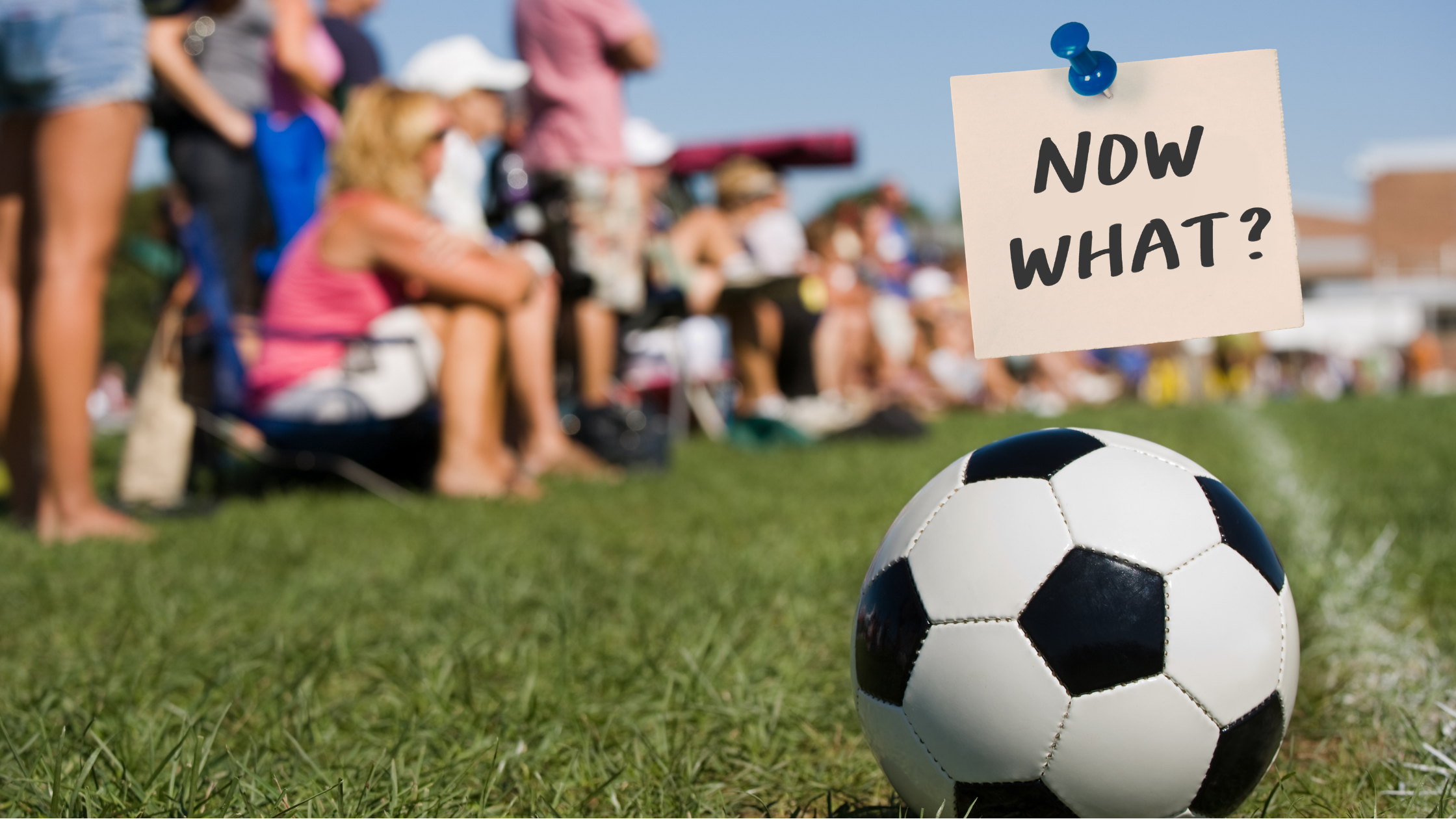 American youth soccer parents watching from the sideline as a soccer ball sits on the field with a note that reads “Now what?” highlighting confusion in the U.S. youth soccer system after Matt Crocker exit